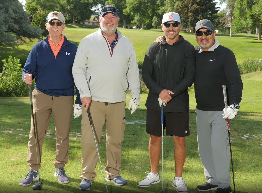 ISU F.A.T. Scramble photo with 4 men golfing
